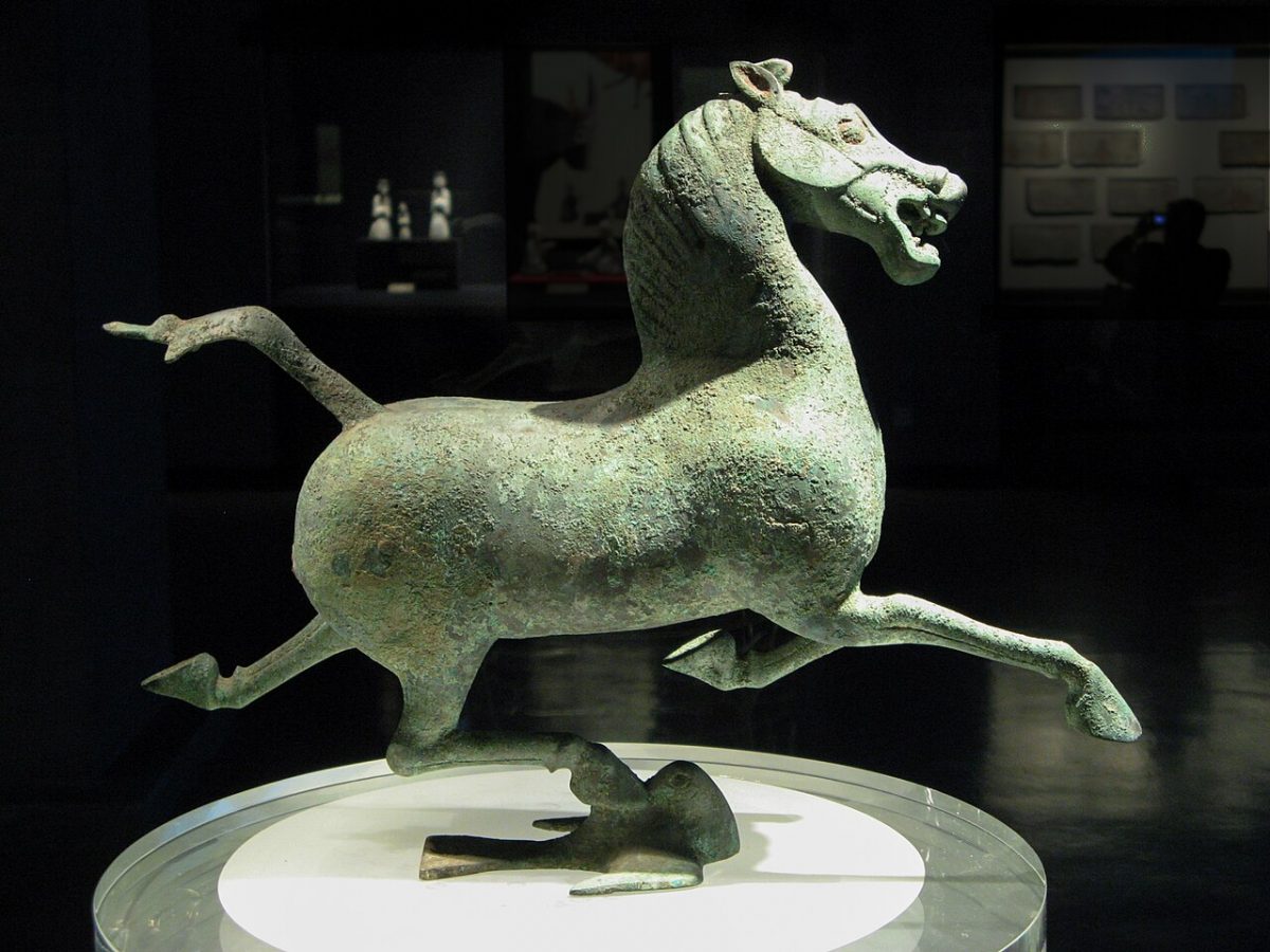 Flying Horse Of Gansu. Eastern Han dynasty, 25 - 220 AD.
Gansu Provincial MuseumThis outstanding bronze horse has become an iconic emblem of China. Racing through the skies, it treads on a swallow (base of statue) that looks up in amazement. Unlike Pegasus, the Western flying horse, the wingless Han steed is meant to be understood metaphorically rather than literally; it represents an ideal horse that can gallop so fast that it seems to outrun the wind.The sculpture is perfectly balanced on only one hoof, to complete the illusion of flight.